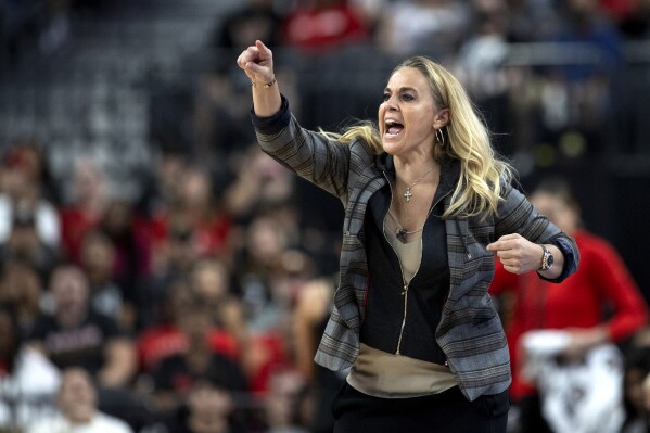 Las Vegas Aces coach Becky Hammon shouts during the second half of Game 1 of the team's WNBA basketball playoff series against the Chicago Sky on Wednesday, Sept. 13, 2023, in Las Vegas. (Ellen Schmidt/Las Vegas Review-Journal via AP)