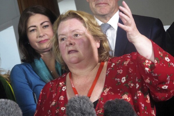 Australian actor Magda Szubanski speaks at Parliament House in Canberra, Australia, Dec. 7, 2017, after parliament voted to allow same-sex marriage across the nation. (AP Photo/Rod McGuirk, File)