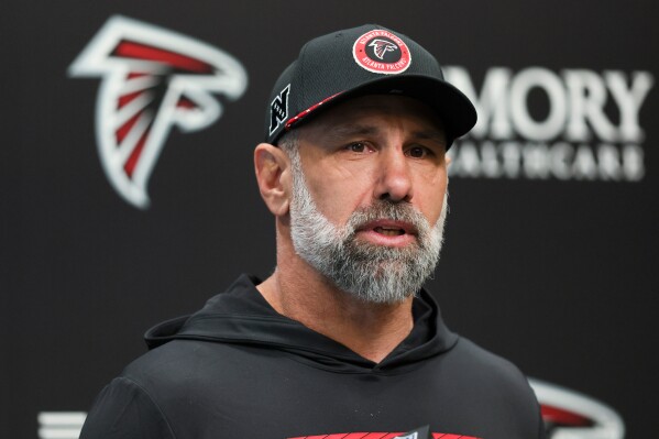 Atlanta Falcons defensive coordinator Jeff Ulbrich speaks with members of the media at the Falcons Training Camp, Jan. 27, 2025, in Flowery Branch, Ga. (Jason Getz/ Atlanta Journal-Constitution via AP, File)