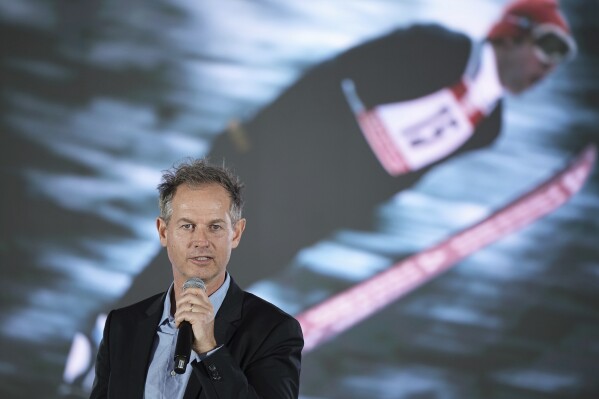 Head of 2030 Olympic Winter Games, Edgar Grospiron, delivers a speech during a press conference to launch the organizing committee for the 2030 Olympic and Paralympic Winter Games, in Decines, outside Lyon, France, Tuesday, Feb. 18, 2025. (AP Photo/Laurent Cipriani)