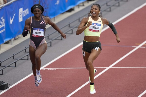 Gabby Thomas celebrates after winning the women's 200-meter final during the U.S. Track and Field Olympic Team Trials Saturday, June 29, 2024, in Eugene, Ore. (AP Photo/Chris Carlson)