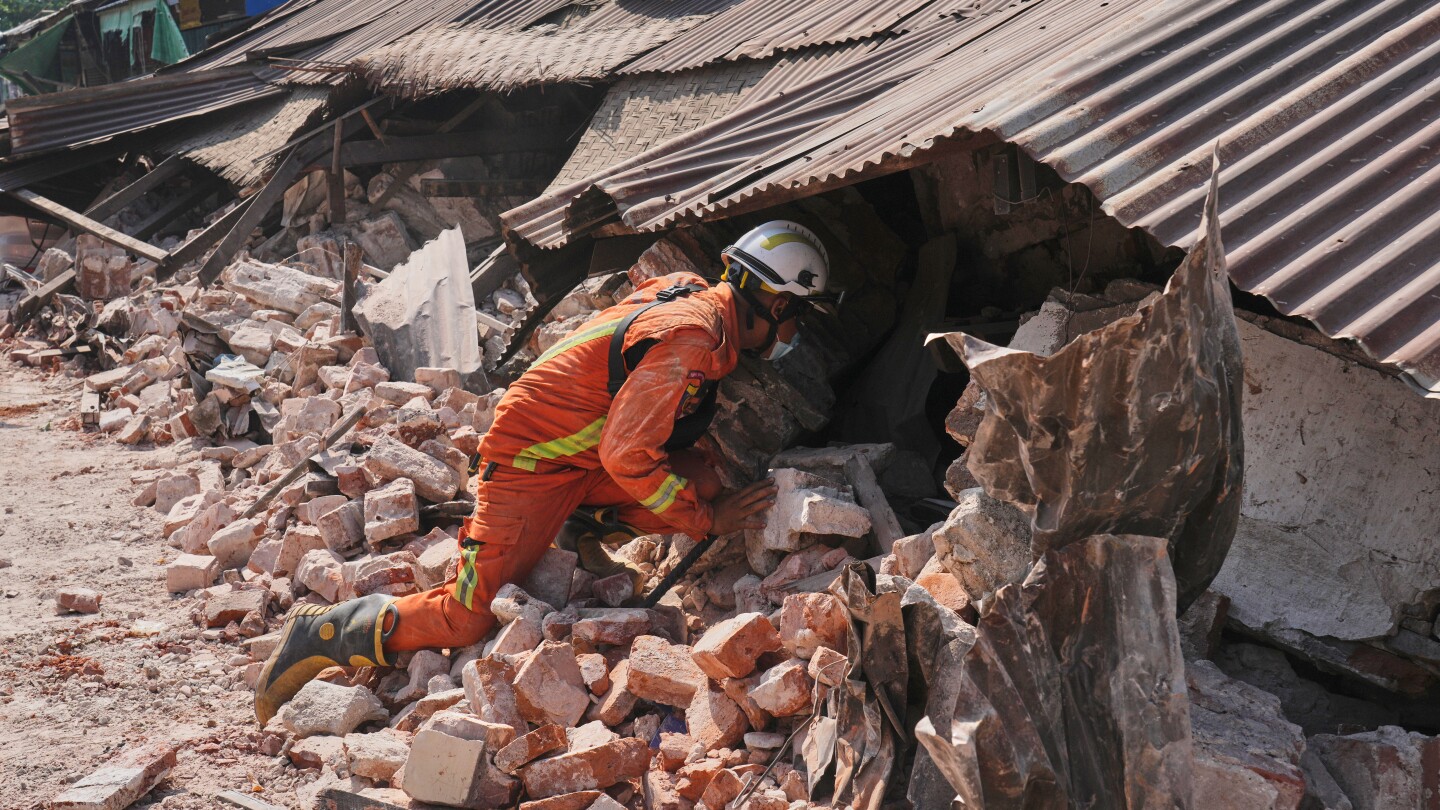 Man rescued from rubble in Myanmar's capital but hope fading of finding more earthquake survivors