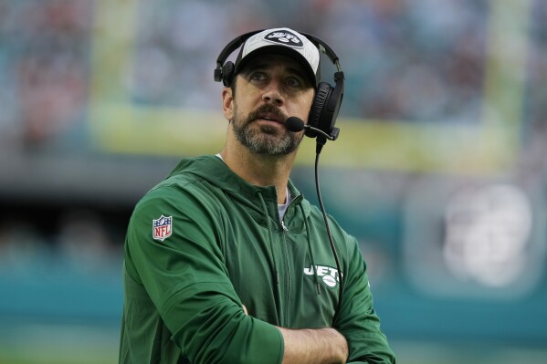 New York Jets quarterback Aaron Rodgers looks up during the second half of an NFL football game against the Miami Dolphins, Sunday, Dec. 17, 2023, in Miami Gardens, Fla. (AP Photo/Lynne Sladky)