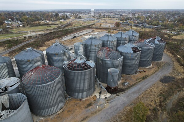 Damage to grain elevators are visible on Thursday, Nov. 9, 2023, at Mayfield Grain in Mayfield, Ky., from a December 2021 tornado. Many local farmers relied on these grain elevators to store their harvested crops. (AP Photo/Joshua A. Bickel)