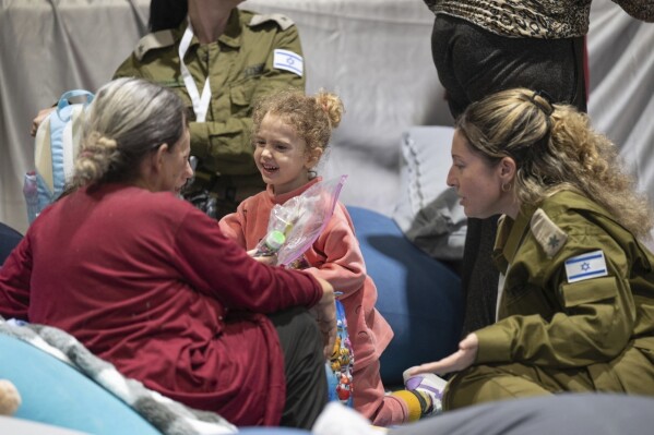 FILE - This handout photo provided by the Israel Prime Minister Office shows Yahel Shoham, 3 years old, upon her arrival in Israel after being freed. Yahel was one of the 13 Israeli hostages that Hamas released late Saturday, Nov. 25, 2023, in the second round of swaps under a cease-fire deal. The phrase "Women and children first" and all it implies about whom to save first in a disaster is rooted in the shipwrecks of centuries past and popularized by Hollywood's treatment of the Titanic disaster is getting another airing at a time when women are expected to do most everything men do. Experts say the unwritten law of the sea is a Hollywood-fed myth and a relic of Victorian-era chivalry. At the center of this round of questions is the prisoners-for-hostages deal between Israel and Hamas last month that prioritized releasing women and children after negotiators agreed that mothers and their children should not be separated. (Israel Prime Minister Office via AP, File)