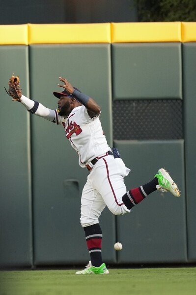 Atlanta Braves - Strong pitching + timely hitting = high fives