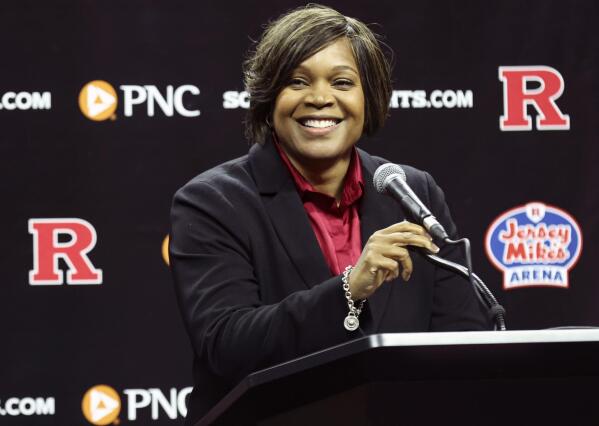 Rutgers women's basketball coach Coquese Washington smiles during her introductory news conference on Tuesday, May 24, 2022 in Piscataway, N.J. (Andrew Mills/NJ Advance Media via AP)