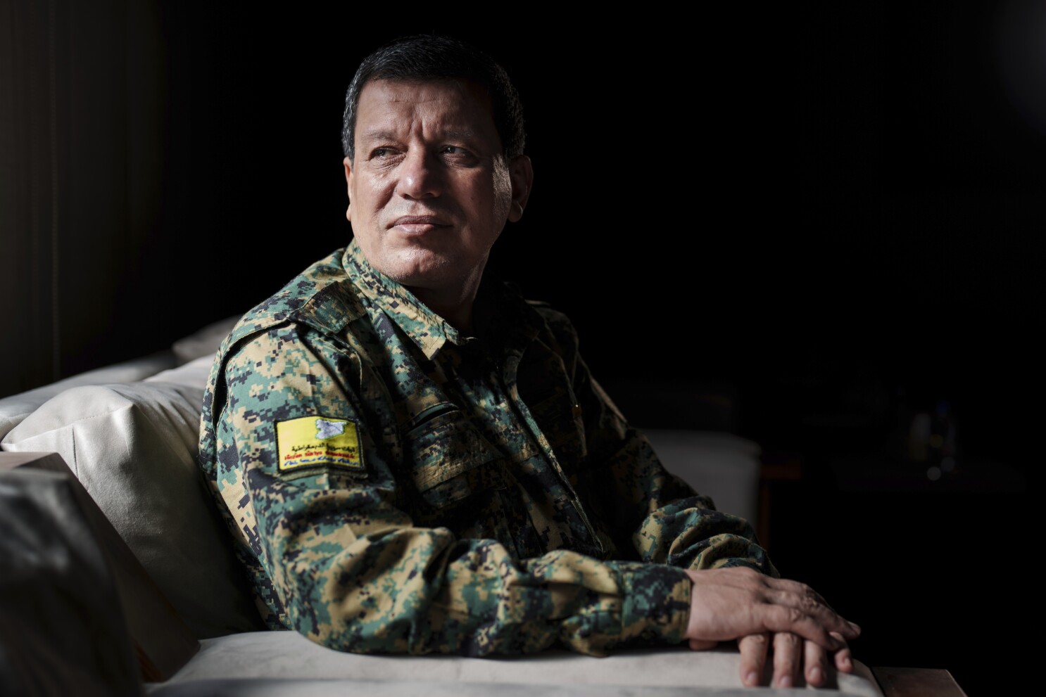US-backed commander says his Kurdish-led group wants a secular and civil state in post-Assad Syria