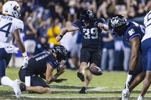 TCU's Griffin Kell (39) his his field-goal attempt blocked on the final play of an NCAA college football game against West Virginia on Saturday, Sept. 30, 2023, in Fort Worth, Texas. (Chris Torres/Star-Telegram via AP)