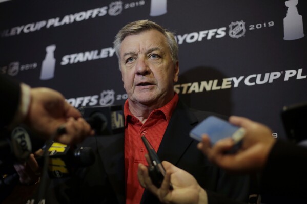 FILE - Carolina Hurricanes general manager Don Waddell faces reporters during a media availability Wednesday, May 8, 2019, in Boston. Waddell has stepped down as president and general manager of the Carolina Hurricanes, ending a run that had him build a roster that has reached the NHL playoffs for six straight years. The team announced Waddell's decision in a news release Friday, May 24, 2024, saying that assistant general manager Eric Tulsky would work as interim GM until the end of a search for a permanent successor. (AP Photo/Steven Senne, File)