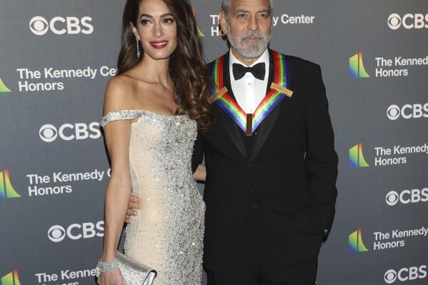 2022 Kennedy Center Honoree George Clooney and his wife, Amal Clooney, arrive at the Kennedy Center Honors on Sunday, Dec. 4, 2022, at The Kennedy Center in Washington. (Photo by Greg Allen/Invision/AP)