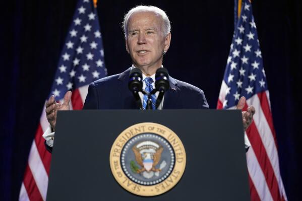 President Joe Biden speaks to the House Democratic Caucus Issues Conference, Wednesday, March 1, 2023, in Baltimore. Biden's administration is starting a push to get Congress to fund measures to help prosecute fraud in governmental pandemic relief programs. The plans also include measures to prevent future identity theft and help victims. The request is for $1.6 billion.(AP Photo/Evan Vucci)
