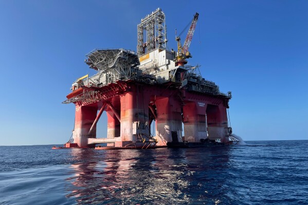 This undated picture released by TotalEnergies shows the drilling rig, Transocean Barents, which arrived at its location in the Mediterranean Sea on Wednesday, Aug. 16, 2023. The rig is expected to begin drilling in September in Lebanese waters near the border with Israel after the two countries reached a deal last year on their maritime border. Lebanon and Israel have formally been at war since Israel's creation in 1948. (TotalEnergies via AP)