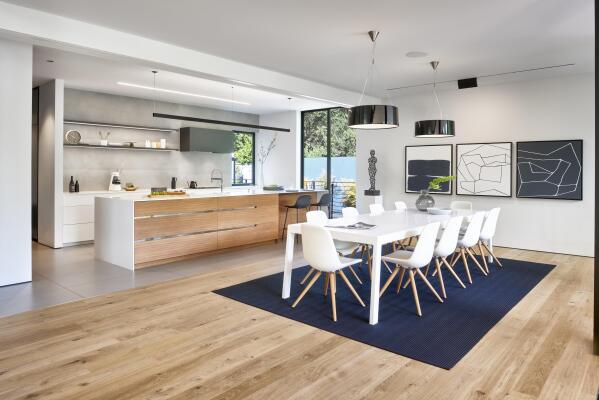 the concept of New Year's decor of a modern kitchen in light colors. front  view of the countertop with kitchen utensils and decorations 13941444 Stock  Photo at Vecteezy