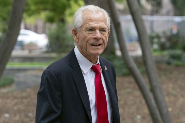 FILE - Former Trump White House trade adviser Peter Navarro arrives at the E. Barrett Prettyman U.S. Federal Courthouse, in Washington, Aug. 28, 2023. Navarro was convicted Thursday, Sept. 7, of contempt of Congress charges filed after he was accused of refusing to cooperate with a congressional investigation into the Jan. 6, 2021, attack on the U.S. Capitol. (AP Photo/Jose Luis Magana, File)