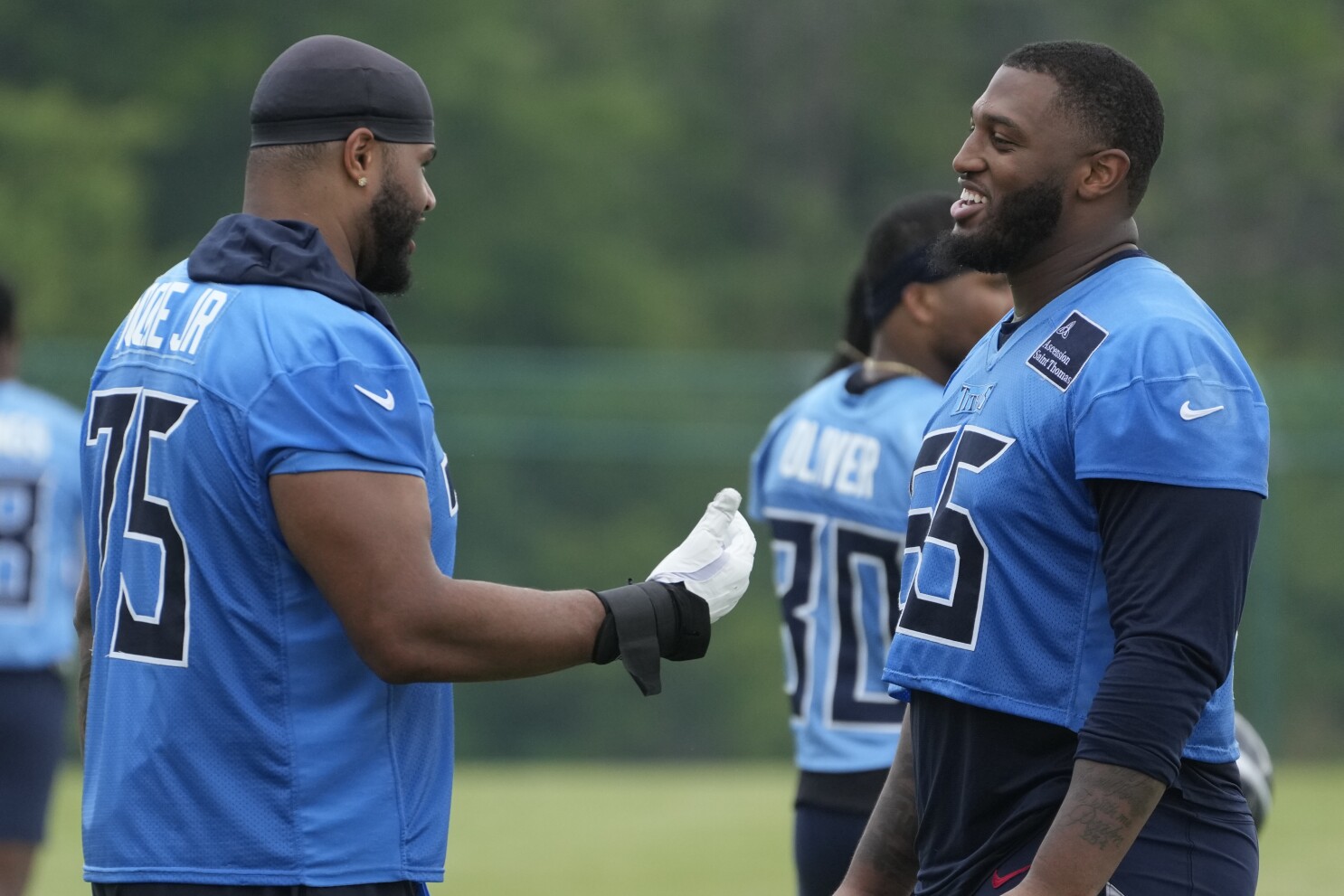 Titans revamp offensive line to protect top pick Cam Ward