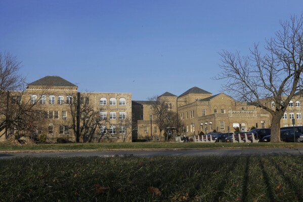 FILE - The ICL Milestone building at the Creedmoor Psychiatric Center campus in the Queens borough of New York is pictured on Jan. 4, 2013. New York City will set up a shelter for up to 1,000 migrants in the parking lot of the state psychiatric hospital as thousands of asylum seekers continue to arrive in the city weekly, officials said Wednesday, July 26, 2023. (AP Photo/Frank Franklin, File)