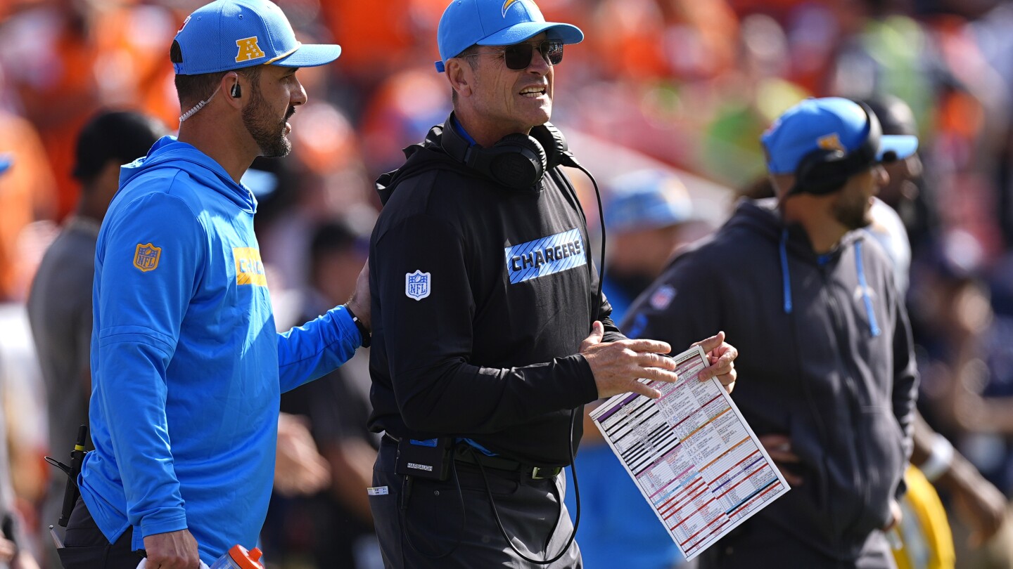 Jim Harbaugh wearing heart monitor after irregular heartbeat