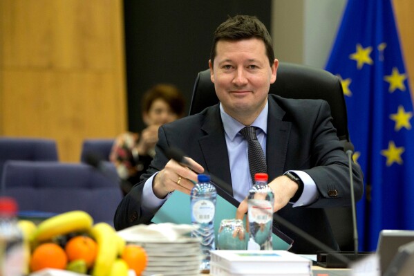 FILE- In this March 7, 2018 file photo, Secretary-General of the Commission Martin Selmayr waits for the start of a meeting at EU headquarters in Brussels. The European Union’s executive branch has strongly criticized the bloc’s representative in Austria for accusing the country of paying “blood money” to Russia for gas supplies. It said Friday, Sept. 8, 2023 that he has been ordered back to Brussels for discussions on the matter. EU representative Martin Selmayr said at a panel event on Wednesday that Austria continues to get 55% of its gas from Russia. He said: “That surprises me, because blood money is being sent to Russia every day with the gas bill.” On Thursday, Austria’s Foreign Ministry said that Selmayr had been summoned for a meeting with one of the ministry’s top officials. (AP Photo/Virginia Mayo, File)