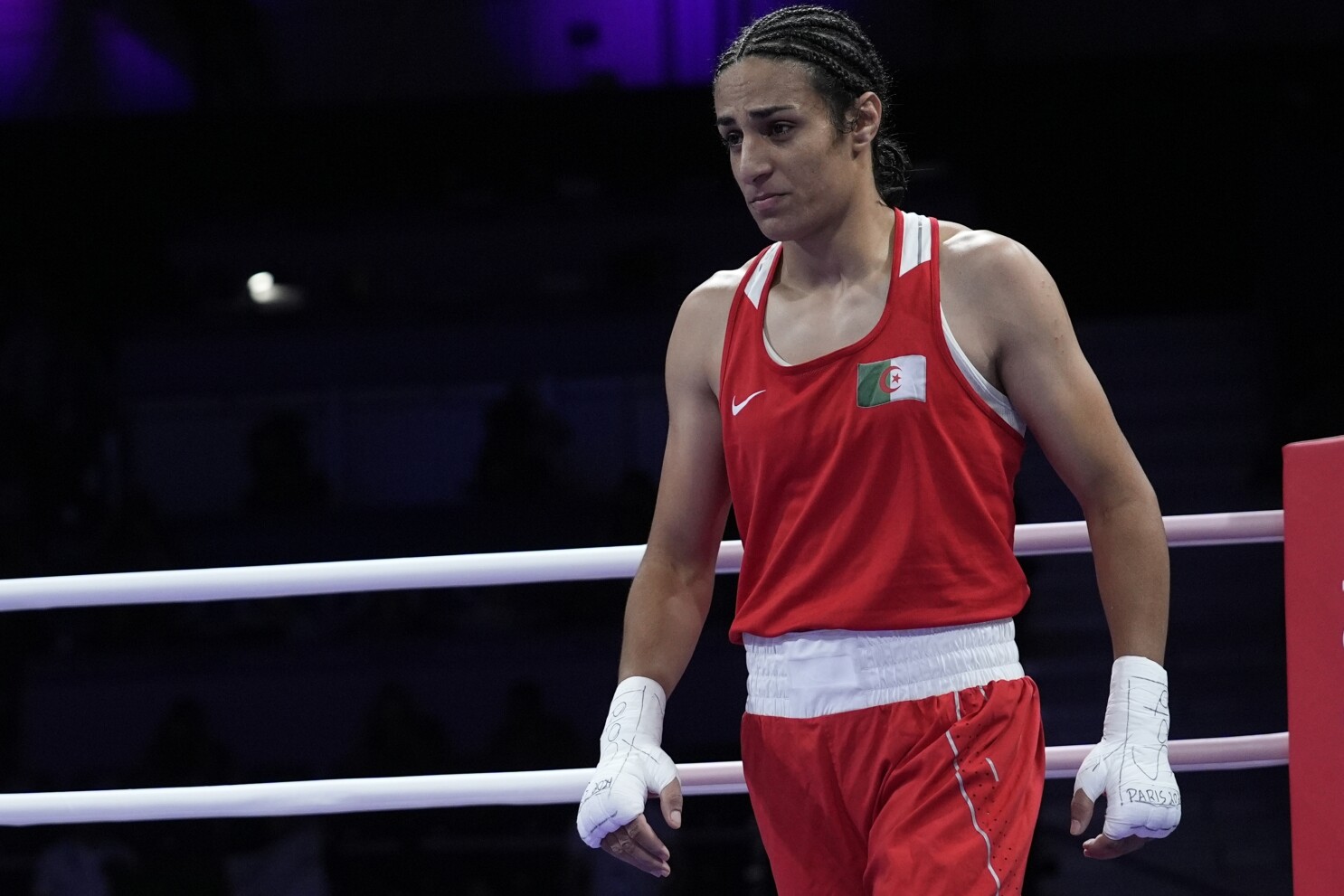 Who is Imane Khelif? Algerian Olympic boxer facing gender outcry | AP News