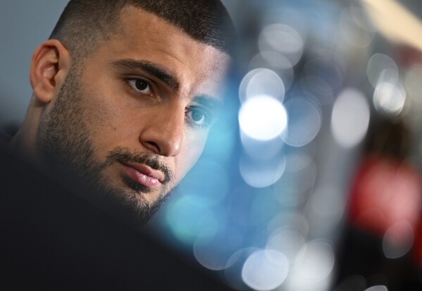 German soccer player Deniz Undav attends a press conference before the international match between France and Germany, at the DFB Campus in Frankfurt, Germany, Thursday March 21, 2024. (Arne Dedert/dpa via AP)