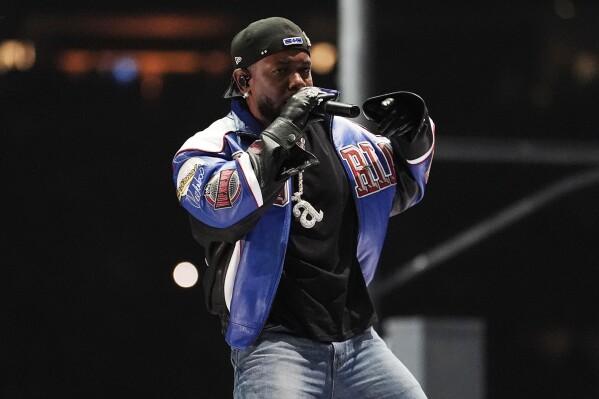 Review: Kendrick Lamar brings 'Not Like Us' to a historic Super Bowl halftime show | AP News