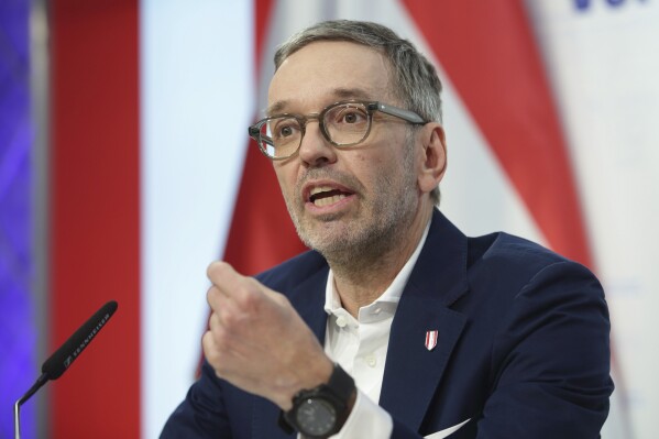 The leader of Austria's Freedom Party, Herbert Kickl, addresses a news conference, in Vienna, Austria, Tuesday, Jan 7, 2025. Herbert Kickl received a mandate Monday to try to form a new government. (AP Photo/Heinz-Peter Bader)