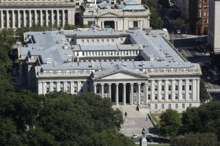 FILE - The U.S. Treasury Department building viewed from the Washington Monument, Wednesday, Sept. 18, 2019, in Washington. Hackers got into computers at the U.S. Treasury Department and possibly other federal agencies, touching off a government response involving the National Security Council. Security Council spokesperson John Ullyot said Sunday, Dec. 13, 2020 that the government is aware of reports about the hacks. (AP Photo/Patrick Semansky, file)