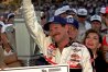 FILE -  In this Aug. 5, 1995 file photo, NASCAR driver Dale Earnhardt of Mooresville, N.C., gives a "thumbs up" to the crowd from victory lante after winning the Brickyard 400 auto race at the Indianapolis Motor Speedway in Indianapolis. (APPhoto/Tom Strattman, File)