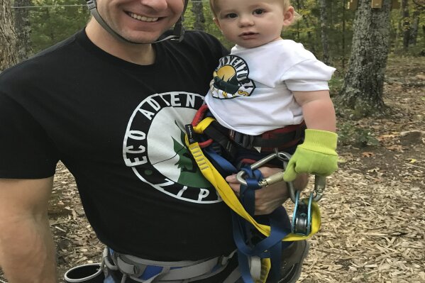 
              In this undated photo provided by Mike Seper shows Seper and his son Connor at Eco Adventure Ziplines in New Florence, Mo. “While I considered deleting Facebook, I understand the importance and reach Facebook has to keep an open channel of communication with our customers,” says Mike Seper, owner of Eco Adventure Ziplines. Seper is concerned that Facebook users, seeing his ads and then viewing other users’ political posts or ads, might mistakenly assume they’re connected. “We just don’t want that association,” says Seper, who had been doing most of his advertising on Facebook. (Shannon Seper/Eco Adventure Ziplines via AP)
            