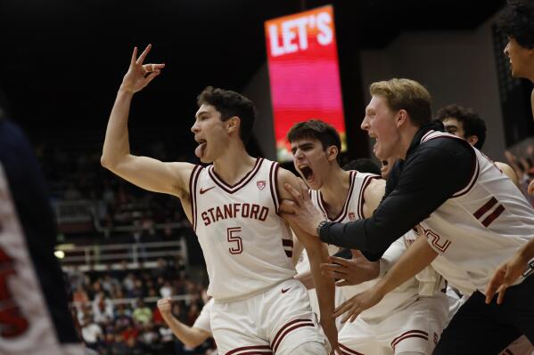 Stanford guard Michael O'Connell (5) celebrates after making a 3-point basket during the second half of an NCAA college basketball game against Arizona, Saturday, Feb. 11, 2023, in Stanford, Calif. (AP Photo/Josie Lepe)