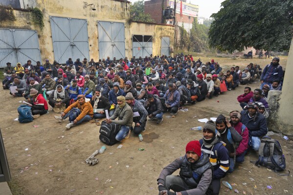 Indian workers aspiring to be hired for jobs in Israel line up during a recruitment drive in Lucknow, India, Thursday, Jan. 25, 2024. (AP Photo/Rajesh Kumar Singh)