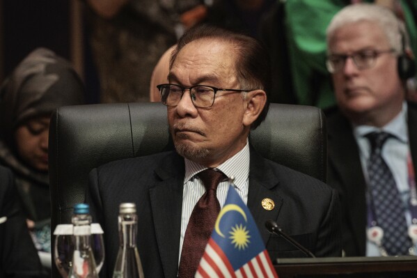 FILE - Malaysian Prime Minister Anwar Ibrahim attends the East Asia Summit at the Association of the Southeast Asian Nations (ASEAN) Summit in Jakarta, Indonesia, Sept. 7, 2023. Marking his first anniversary of coming to power, Malaysian Prime Minister Anwar admitted he was still struggling to win over ethnic Malay votes and acknowledged frustration over the slow pace of reforms. But he defended his unity government, saying it is now politically stable and able to fully focus on bolstering the economy and improving the people's welfare. (Yasuyoshi Chiba/Pool Photo via AP, File)