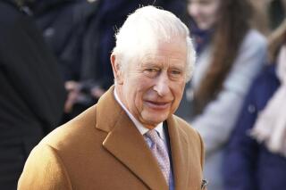 Britain's King Charles III arrives to attend a morning church service at Castle Rising Church in Norfolk, England, Sunday, Jan. 8, 2023. (Joe Giddens/PA via AP)