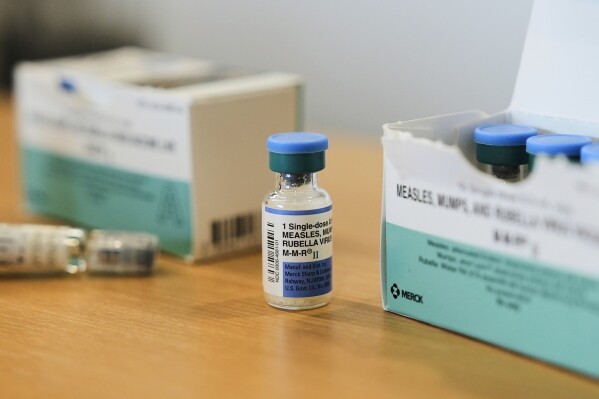 Vials for the measles, mumps and rubella vaccine are displayed at a clinic in Lubbock, Texas, on Feb. 26, 2025. (AP Photo/Mary Conlon, File)
