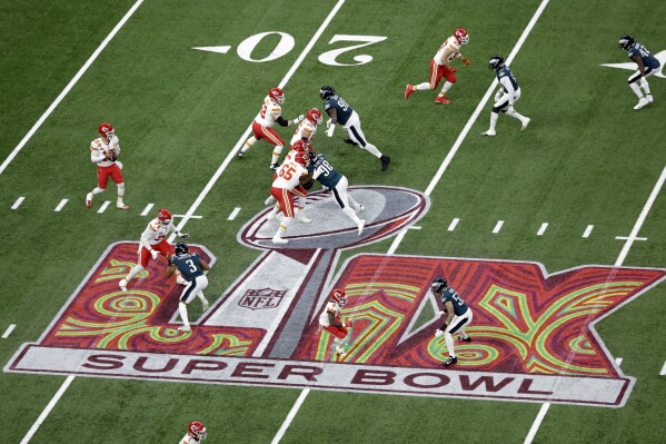 Kansas City Chiefs quarterback Patrick Mahomes (15) looks to pass the ball during the NFL Super Bowl 59 football game against the Philadelphia Eagles Sunday, Feb. 9, 2025, in New Orleans. The Eagles won 40-22. (AP Photo/Adam Hunger, File)