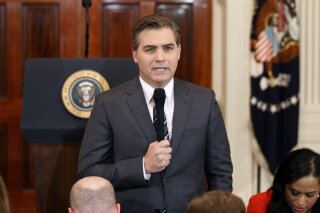 
              FILE - In this Nov. 7, 2018, file photo, CNN journalist Jim Acosta does a standup before a new conference with President Donald Trump in the East Room of the White House in Washington. CNN sued the Trump administration Tuesday, demanding that correspondent Jim Acosta’s credentials to cover the White House be returned because it violates the constitutional right of freedom of the press. (AP Photo/Evan Vucci, File)
            
