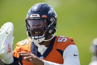 Denver Broncos outside linebacker Bradley Chubb takes part in drills during an NFL football practice at the team's headquarters Thursday, Sept. 9, 2021, in Englewood, Colo. (AP Photo/David Zalubowski)