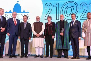 In this photo released by Indian government Press Information Bureau, Indian Prime Minister Narendra Modi, fourth left, poses with other leaders during the inaugural session of 
Raisina Dialogue, a global conference to discuss the most challenging issues facing the world community in New Delhi, India, Tuesday, Jan.14, 2020. (Indian government Press Information Bureau via AP)