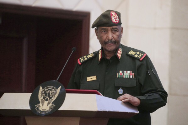 FILE - Sudan's Army chief Gen. Abdel-Fattah Burhan speaks in Khartoum, Sudan, on Dec. 5, 2022. Sudan’s warring generals Gen. Abdel-Fattah Burhan and Gen. Mohammed Hamdan Dagalo, agreed to hold a face-to-face meeting as part of efforts to establish a cease-fire and initiate political talks to end the country’s devastating war, an African regional bloc said Sunday, Dec 10, 2023. (AP Photo/Marwan Ali, File)