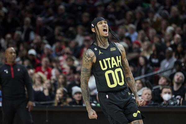 Utah Jazz guard Jordan Clarkson reacts after scoring to give the team the lead against the Portland Trail Blazers during the second half of an NBA basketball game in Portland, Ore., Saturday, Nov. 19, 2022. (AP Photo/Craig Mitchelldyer)