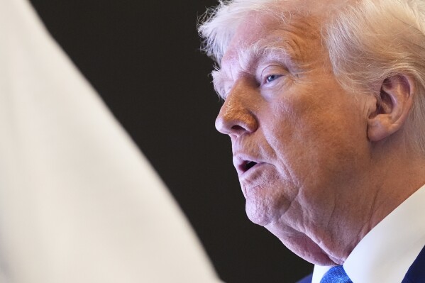 President Donald Trump attends a business meeting at Qasr Al Watan, Friday, May 16, 2025, in Abu Dhabi, United Arab Emirates. (AP Photo/Alex Brandon)
