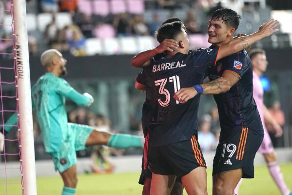 FC Cincinnati forward Brandon Vázquez (19) celebrates with Álvaro Barreal (31) after scoring a goal against Inter Miami during the second half of an MLS soccer match Saturday, July 30, 2022, in Fort Lauderdale, Fla. The game ended in a 4-4 draw. (AP Photo/Lynne Sladky)