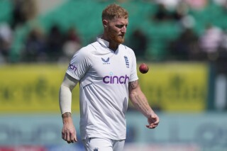 FILE - England's captain Ben Stokes prepares to bowl on the second day of the fifth and final test match between England and India in Dharamshala, India, Friday, March 8, 2024. Stokes ruled himself out of England's defense of the Twenty20 World Cup title in June. Stokes made himself unavailable on Tuesday, April 2, 2024, hoping it will “be a sacrifice that allows me to be the allrounder I want to be for the foreseeable future.”(AP Photo/Ashwini Bhatia, File)