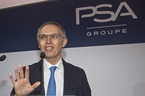 FILE - CEO of PSA Groupe Carlos Tavares arrives for the presentation of the company's 2019 full year results in Rueil-Malmaison, west of Paris, Feb. 26, 2020. Stellantis CEO Carlos Tavares on Wednesday, July 26, 2023 dangled the possibility of relaunching a shuttered Illinois factory if it can be made more competitive as the United Auto Workers Union threatens a strike. (AP Photo/Michel Euler, File)