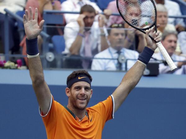 FILE - Juan Martin del Potro, of Argentina, celebrates after defeating John Isner during the quarterfinals of the U.S. Open tennis tournament, Tuesday, Sept. 4, 2018, in New York. Juan Martín del Potro tells The Associated Press he would love to play at the U.S. Open this year if his body will allow it. (AP Photo/Carolyn Kaster, File)