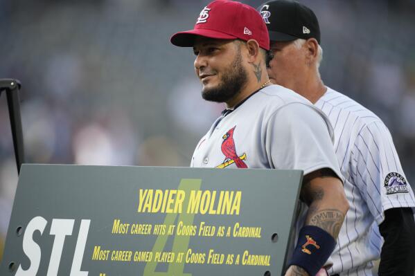 Nolan Arenado stars as a Cardinal at Coors Field