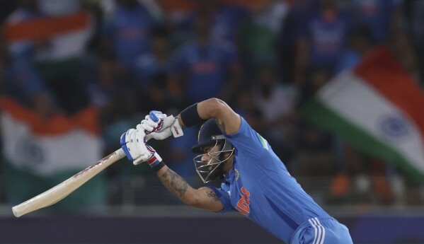 India's Virat Kohli plays a shot during the ICC Champions Trophy semifinal cricket match between India and Australia at Dubai International Cricket Stadium in Dubai, United Arab Emirates, Tuesday, March 4, 2025. (AP Photo/Christopher Pike)