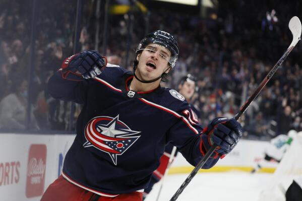 Columbus Blue Jackets' Cole Sillinger celebrates his goal against the San Jose Sharks during the second period of an NHL hockey game Sunday, Dec. 5, 2021, in Columbus, Ohio. (AP Photo/Jay LaPrete)