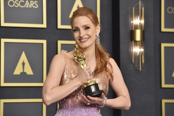 Jessica Chastain, winner of the award for best performance by an actress in a leading role for "The Eyes of Tammy Faye", poses in the press room at the Oscars on Sunday, March 27, 2022, at the Dolby Theatre in Los Angeles. (Photo by Jordan Strauss/Invision/AP)
